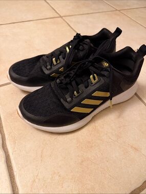 adidas Black Sneakers with Gold Stripes and White Sole